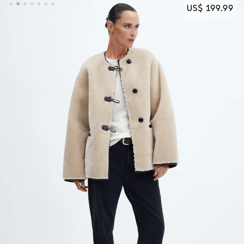 Mango Fur-effect coat with appliqués